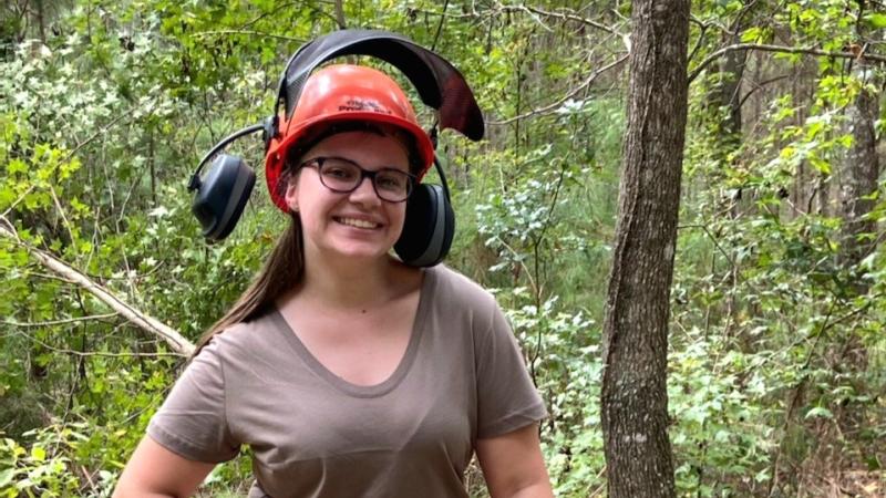 A photo of Brianna Moorehead at Devils Millhopper State Park 